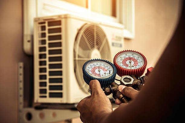 Professional Air Conditioning Service technician working in Edgewood, PA